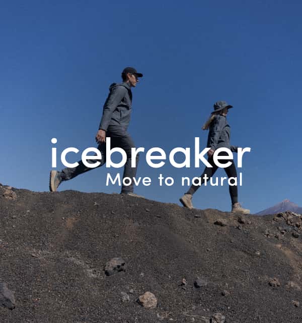 Icebreaker Logo auf Bild von zwei Wanderern